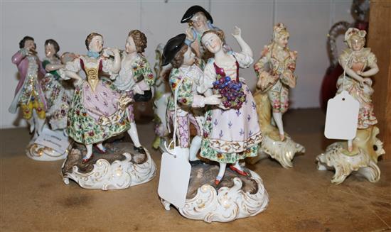 2 pairs of Continental porcelain groups of figures and two others, including a gentleman with a spy glass (6)